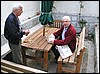 Puki, Radu Bancila at table with photos 1.JPG